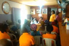 A-general-meeting-held-at-the-vocational-center-with-the-Founder-educating-women-on-domestic-violence.